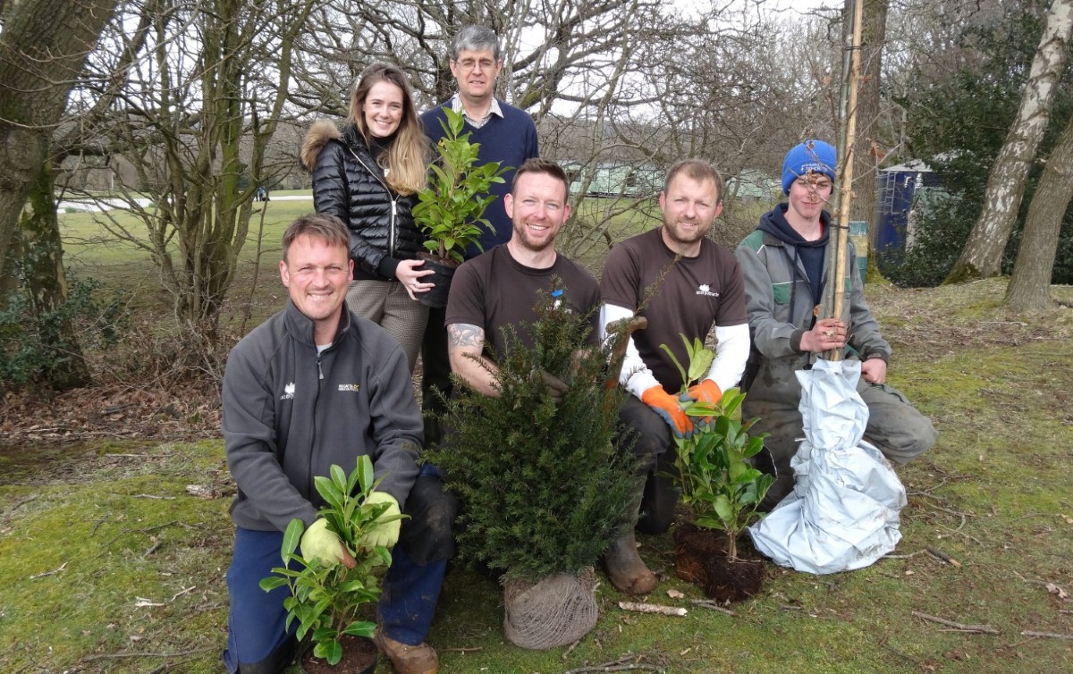 Branching out: Michael Holgate (rear) says staff played a big part in putting 500,000 years of tree life into motion