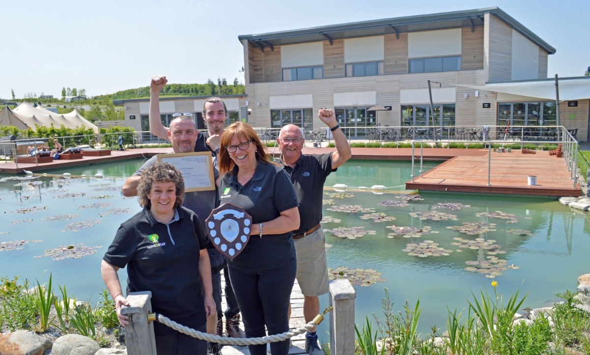 Love2Stay manager Geoff Plumridge and staff members Charlotte Auterson, Steve and Kay Gallagher and Brendan Leach with the Mayor Awards for Tourism.