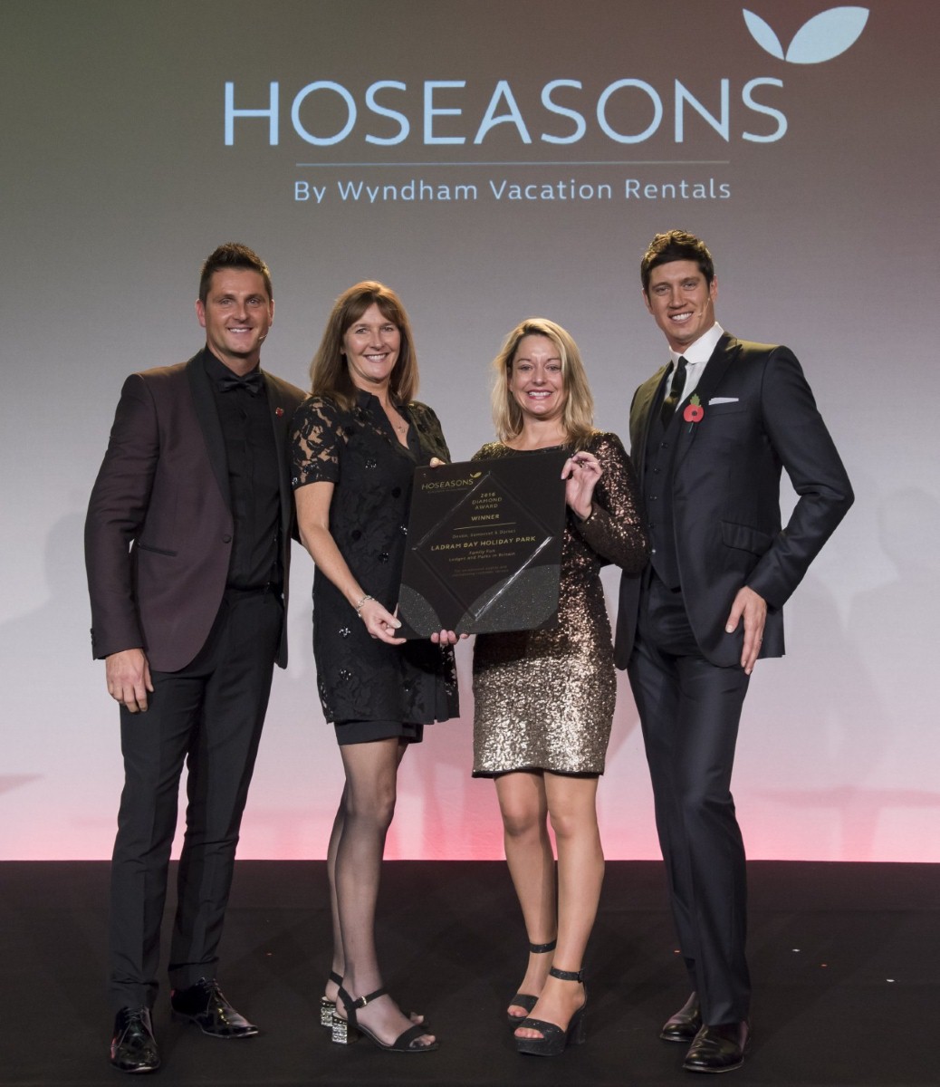 Celebration time as Ladram Bay takes to the winners podium at the Hoseasons conference.