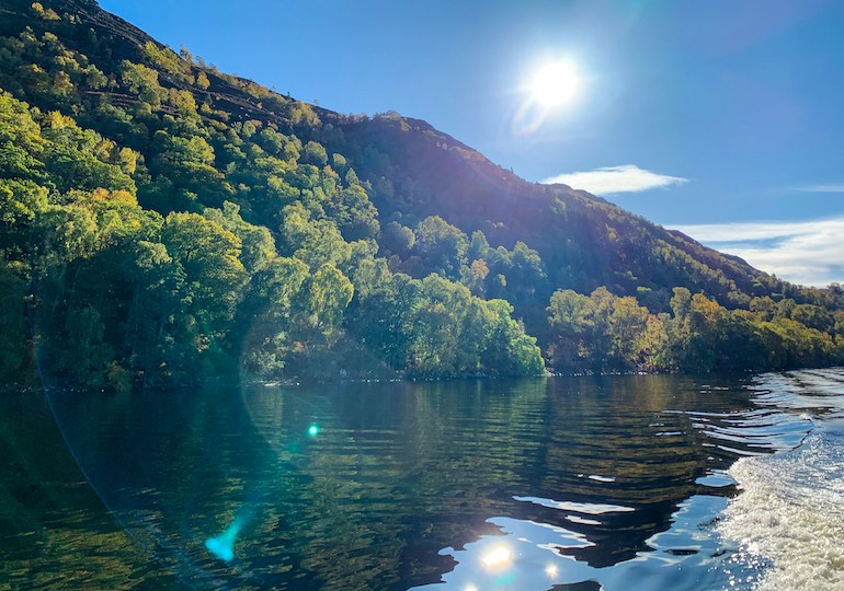 Sun reflecting on the water of a Scottish loch