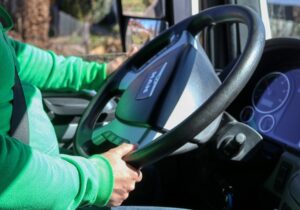 Hands on a steering wheel