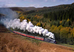 A steam train in the autumnal countryside